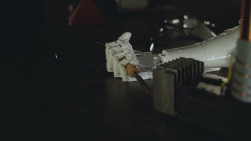 The Robotic Hand Clamped the Burner and Works with It