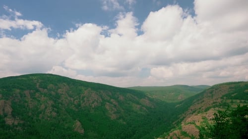 Clouds Over Green Mountains