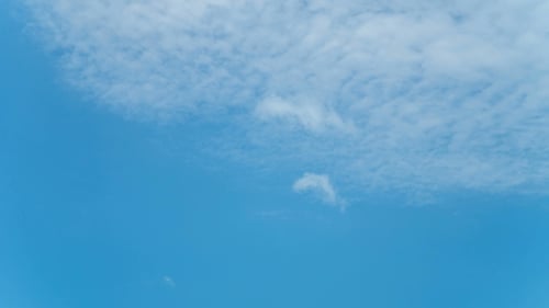 Time Lapse of Blue Sky with White Clouds
