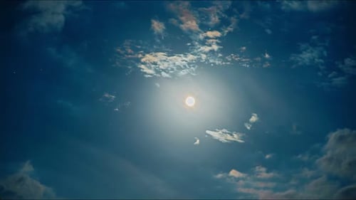 Dramatic Clouds Illuminated by the Full Moon