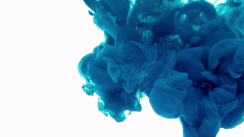 Vibrant Blue Ink Swirling in White Background
