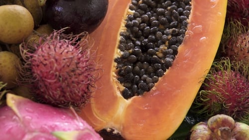 Assortment of Exotic Tropical Thai Fruit Including Papaya, Rambutan, Dragonfruit, Longan, Mangosteen