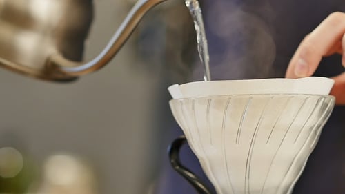 Pouring Hot Water for Delicious Coffee