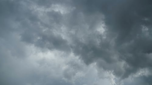 Ominous Storm Clouds Drifting Slowly in Daytime