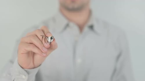 Man Writing on Clear Surface with Marker