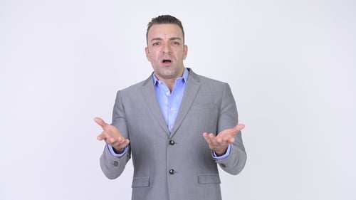 Man in Suit Speaking and Gesturing