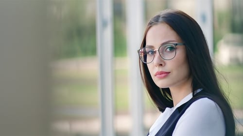 Attractive Brunette Woman Wearing Glasses Posing