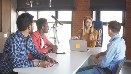 Business People at Work in a Busy Luxury Office Space