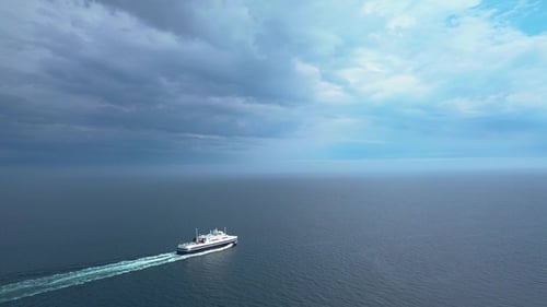 Boat Crossing the Ocean