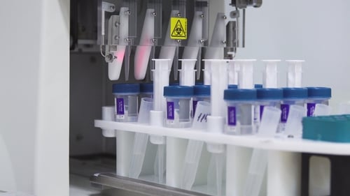 Automated Machine Processing Vials in a Sterile Lab