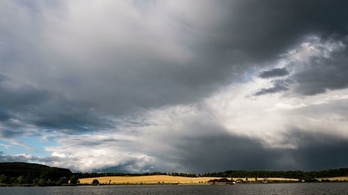 Clouds Crossing the Amazing Sky Over the Lake at Storm
