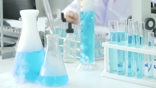 Laboratory Experiment with Test Tubes and Blue Liquid