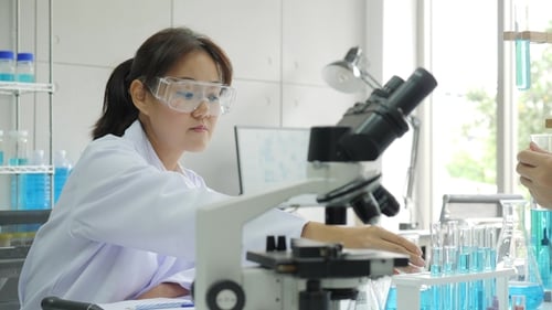 Scientists Conducting Research in a Bright Laboratory