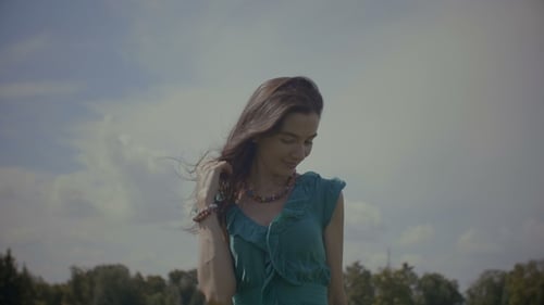 Woman with Brown Hair Enjoys Summer Weather