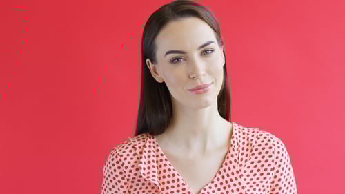 Smiling Woman Portrait on Red Background