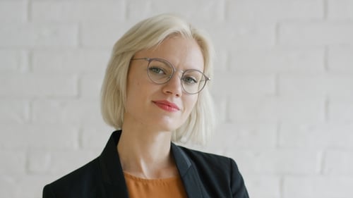 Confident Businesswoman Looking at Camera