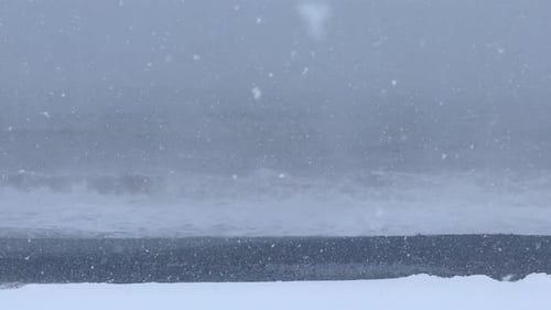 Close Up Snowing On Beach Static.Edited New