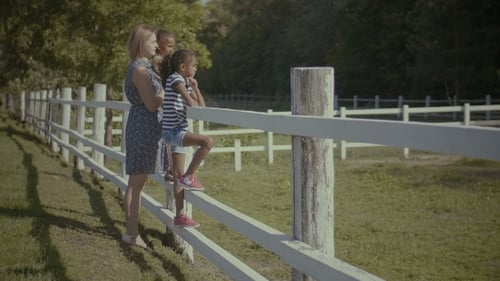 Woman and Children Looking at Countryside View
