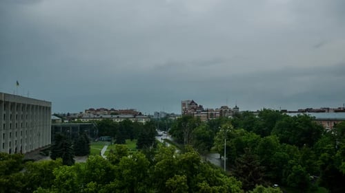 Coming Hard Thunderstorm Over City, Black Clouds Drag the Sky
