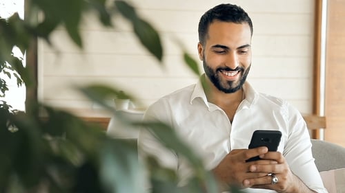 Man Uses Phone