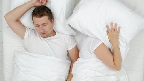 Snoring Man Choking Out Loud Waking His Wife Up During the Noisy Night and She Close Ears with
