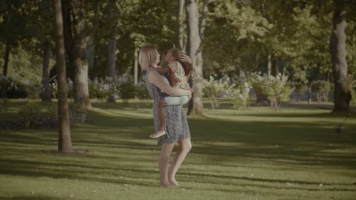Multi Ethnic Happy Family Bonding in Summer Park