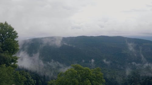 Green Mountain Landscape and Foggy Sky. Cloudy Sky in Mountain