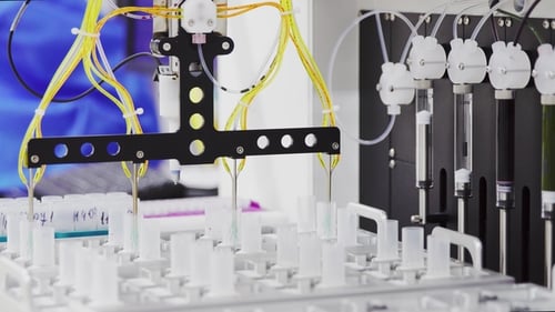 Robotic Lab Machine Processing Test Tubes