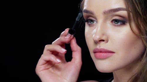 Woman Applying Mascara, Close Up, Beauty Theme