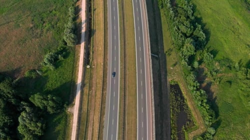Aerial Vertical Shot. Cars Driving By the Road. Traffic on the Highway. Footage From Drone