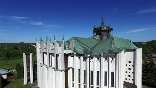 Church in Small City Among Pastures. Drone Footage