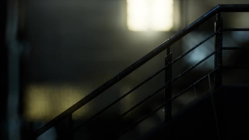 Atmospheric Night Rain Falling on Metal Railing