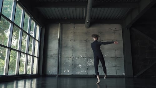 Young Male Dancer Ballet Danced on Tiptoe in Studio