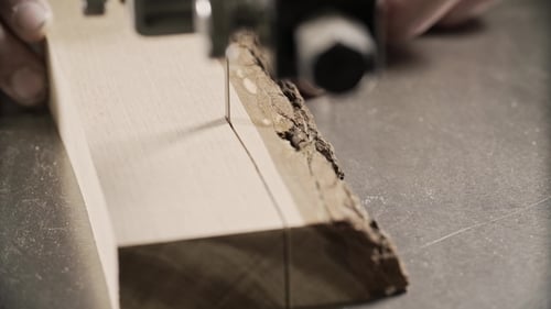 Close Up Cutting Wood with a Band Saw