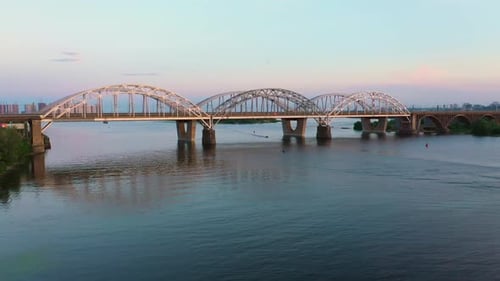City Scape with Reflecting Bridge on the River