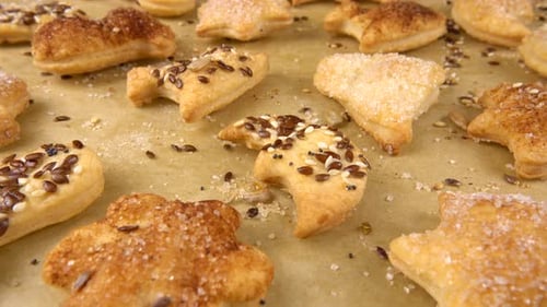 The process of making cookies from shortbread dough.