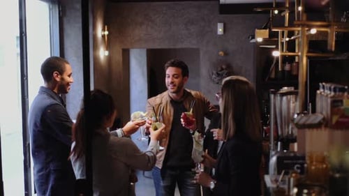 Friends having a drink at a bar