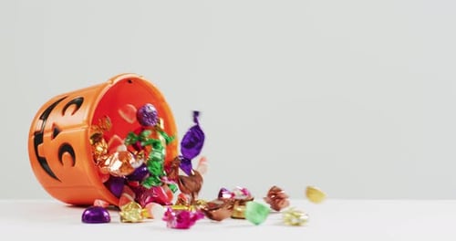 Halloween Candy Bucket Spills Delicious Wrapped Candies