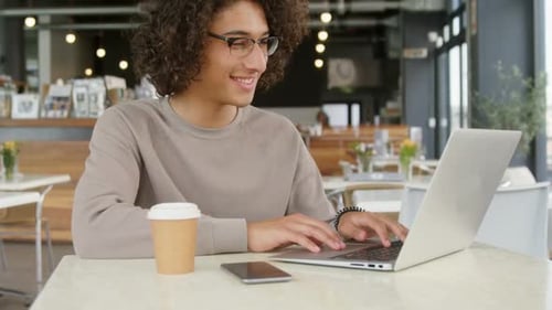 Man using laptop 4k