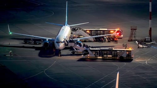Boarding The Plane At Airport