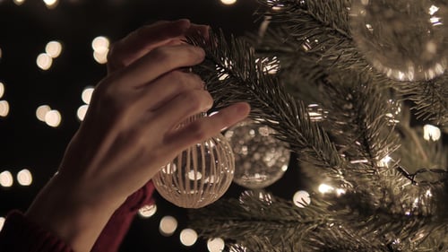 Christmas tree Being Decorated