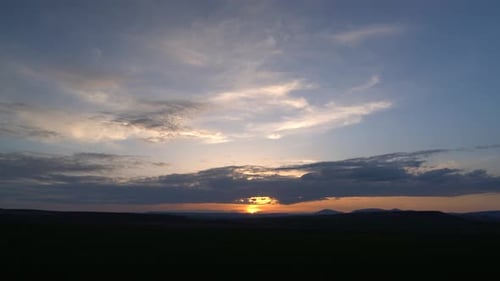 Sunset in Flat and Large Plain