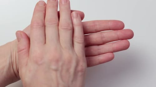 Hands Presenting Word Love Spelled Out in Letters