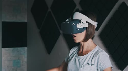 Woman Immersed in Virtual Reality Gaming Experience