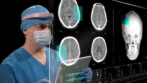 Surgeon Examining Brain Scans on Digital Interface