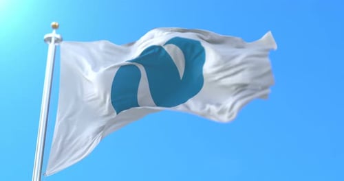 Realistic Waving Flag with Placeholder Logo on Blue Sky