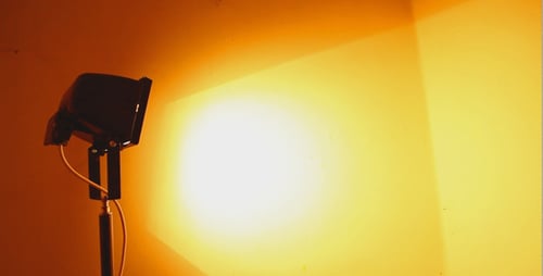 Studio Light Illuminating a Blank Corner Wall