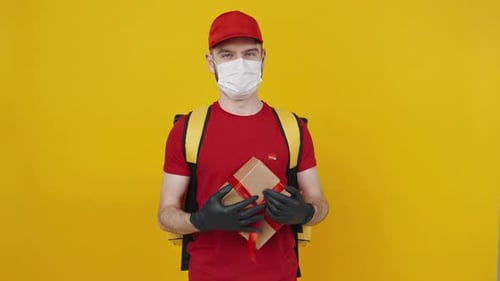 Delivery Man Presents Gift with a Smile