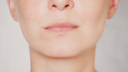 Close Up Face Young Woman Eating Chips