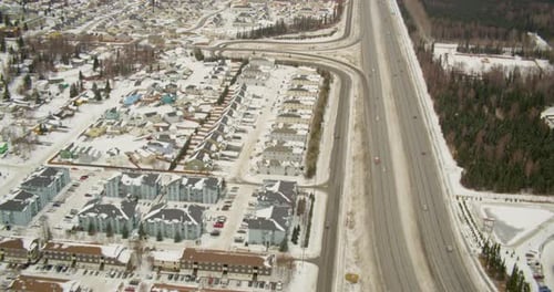 Helicopter aerial shot rising above green hills, day
